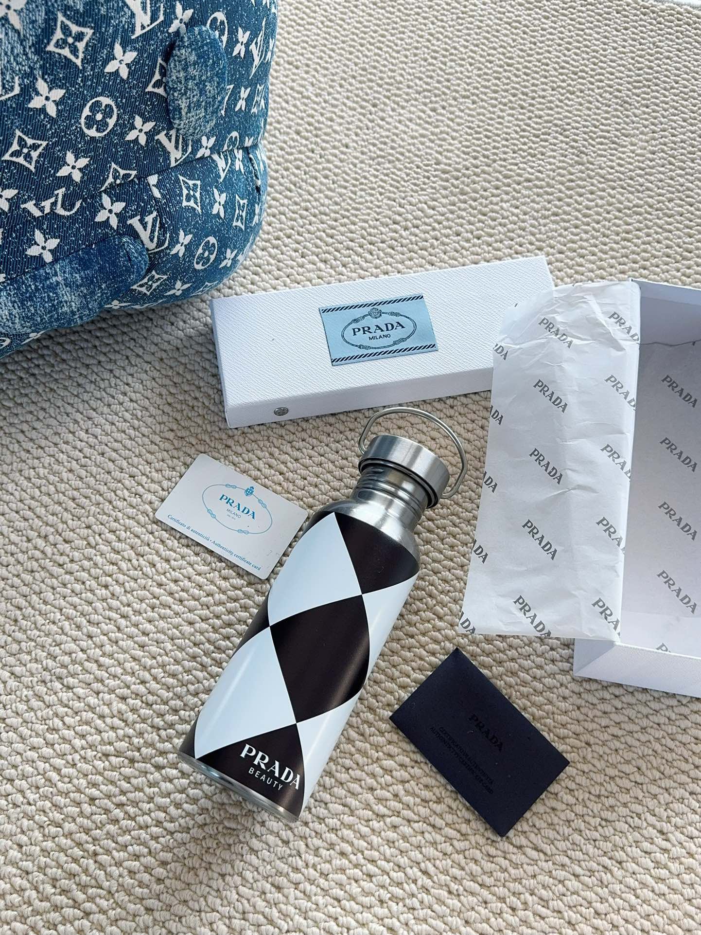 PRADA CHECKERED STAINLESS STEEL BOTTLE