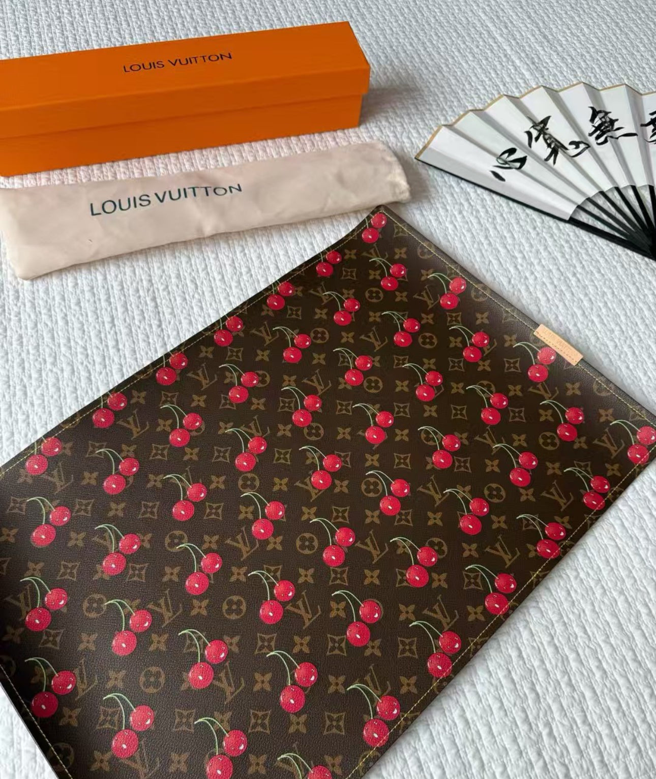 LV CHERRY EATING PLACEMAT (BROWN)