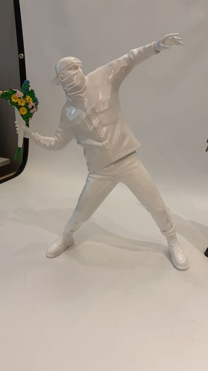 FLOWER BOMBER FIGURINE