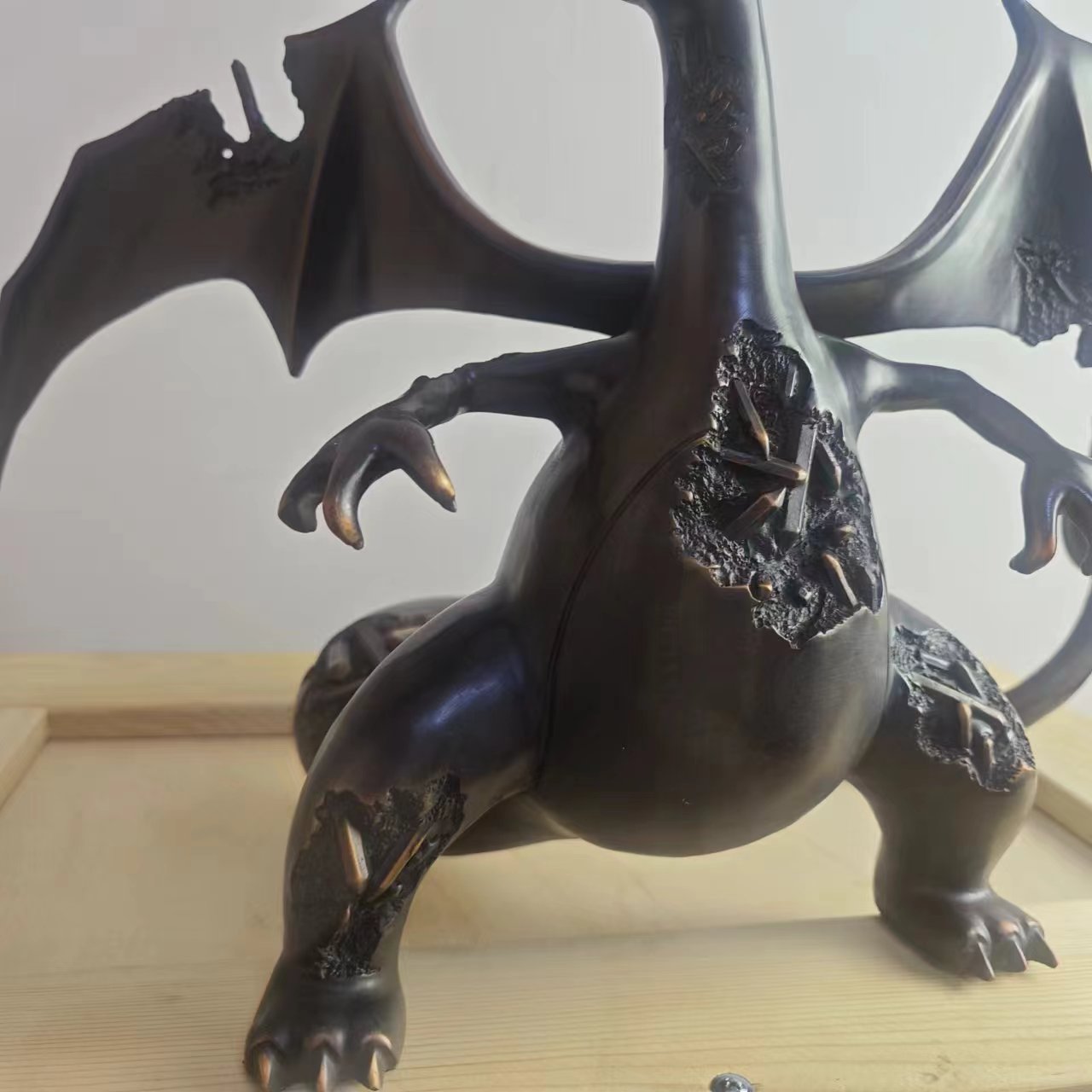 ERODED BRONZE CHARIZARD RELIC