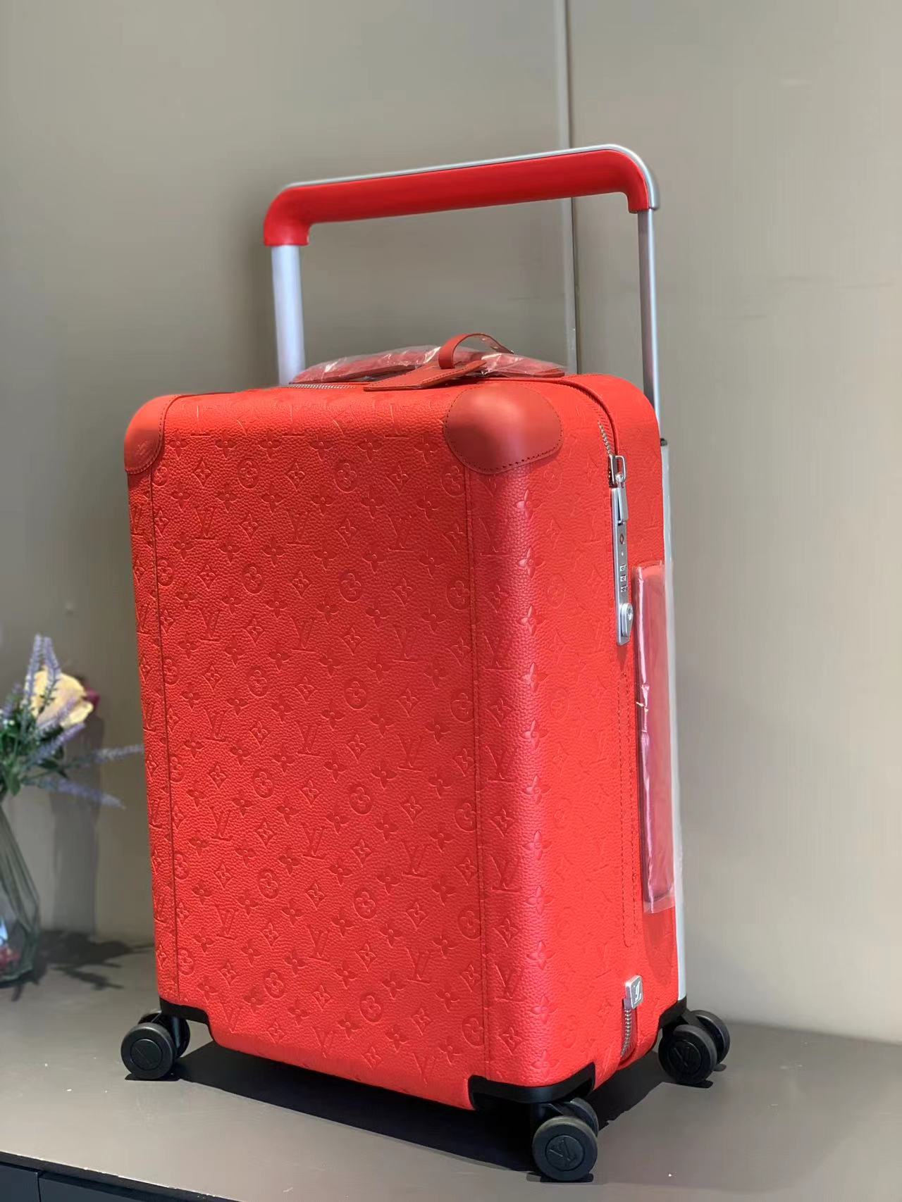 CUSTOM TAURILLON RED 37L HORIZON 55 SUITCASE