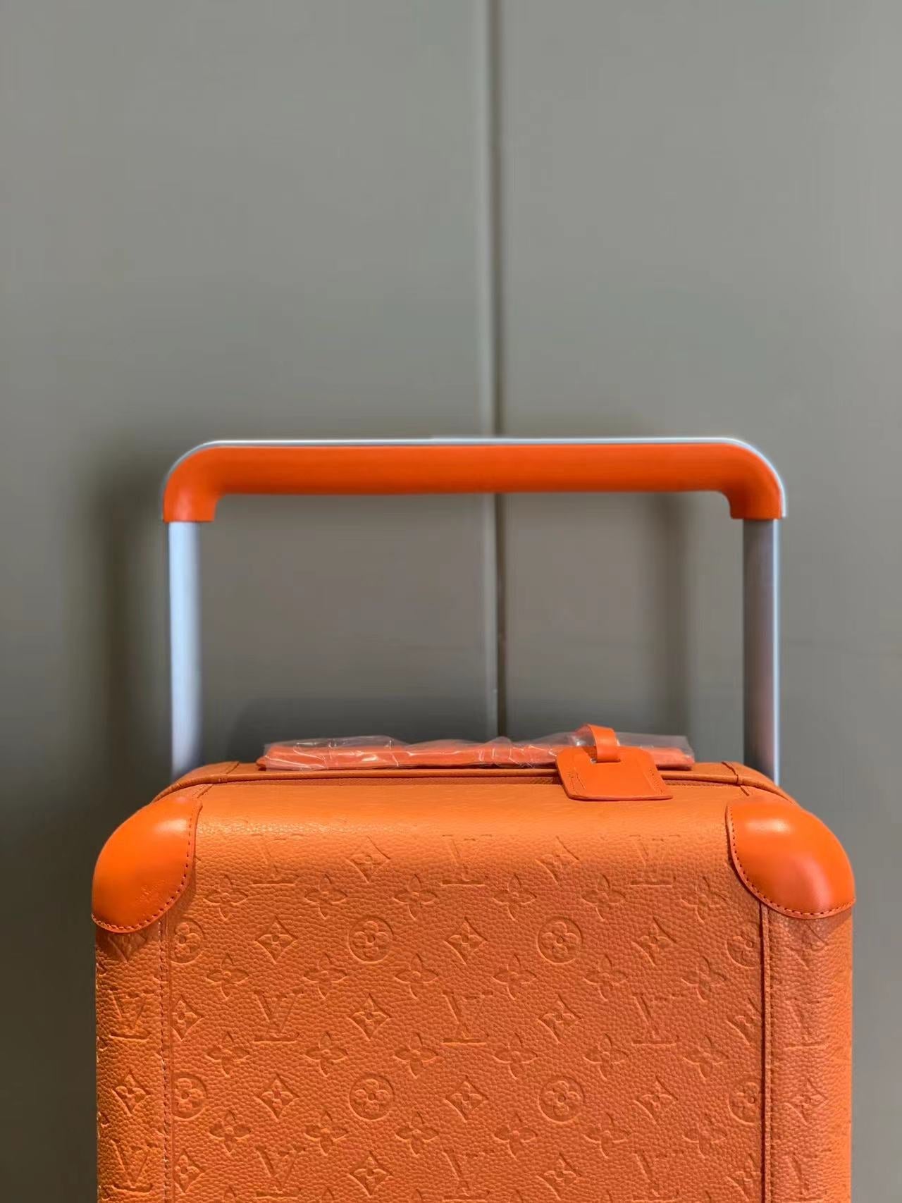CUSTOM TAURILLON ORANGE 37L HORIZON 55 SUITCASE
