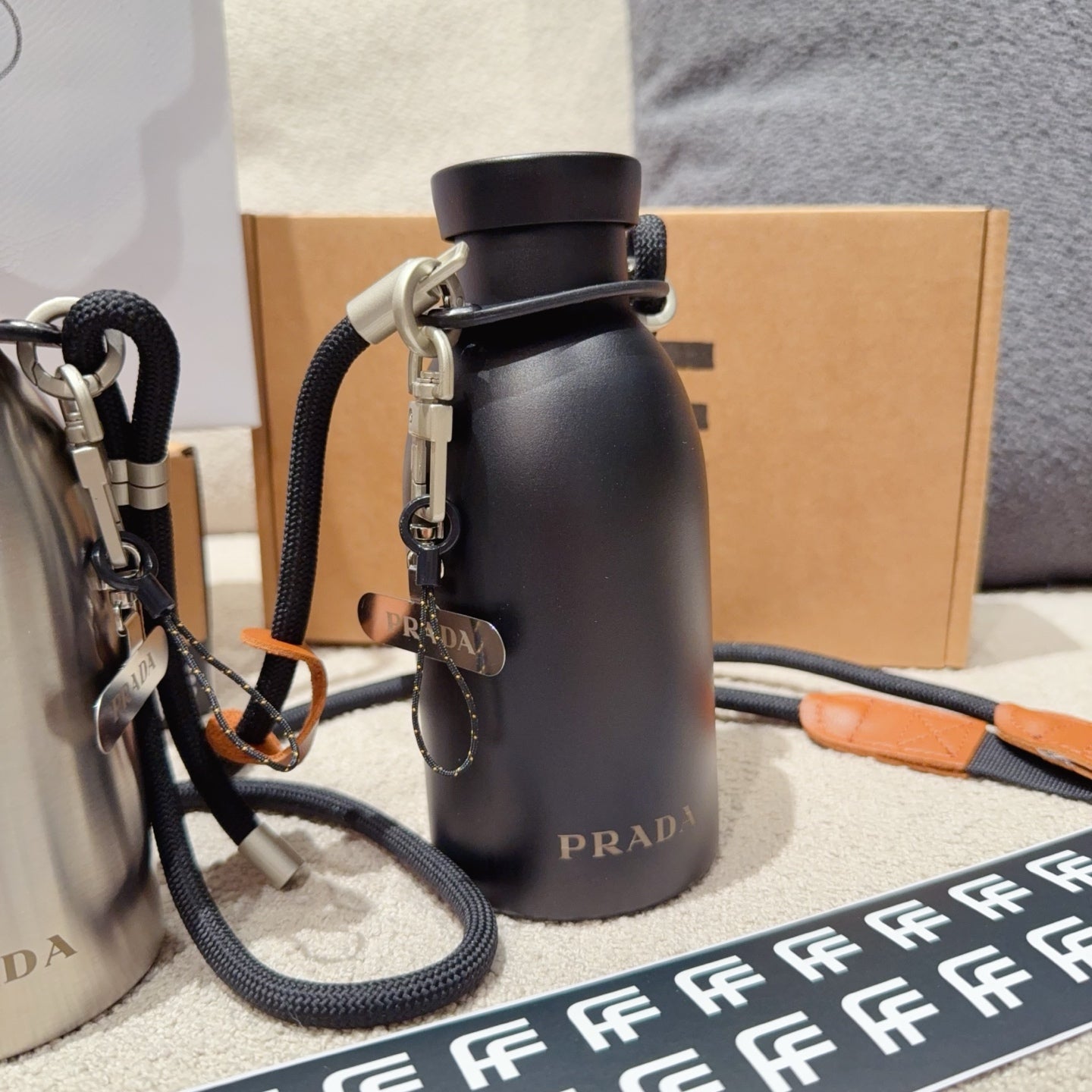 PRADA STEEL BOTTLE WITH STRAP