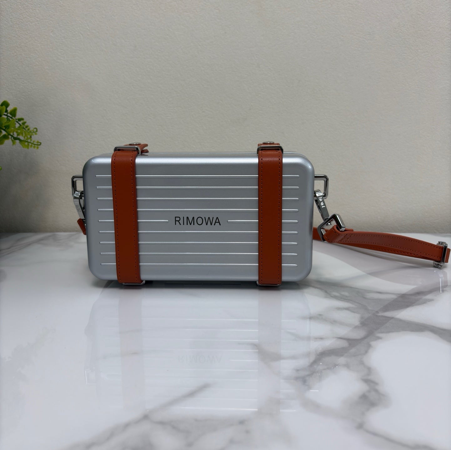 CHRISTIAN CROSS-BODY CLUTCH (BROWN)