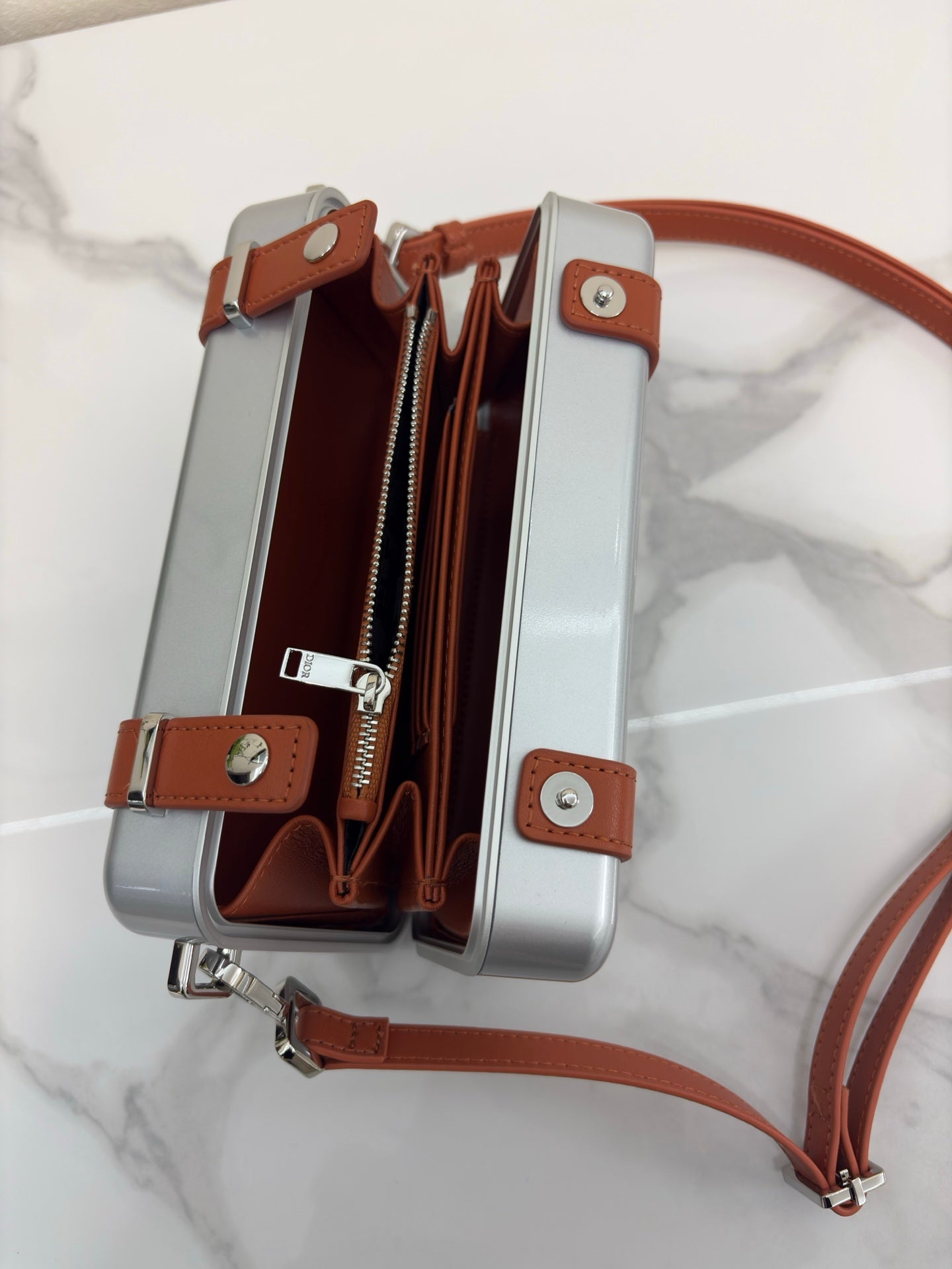 CHRISTIAN CROSS-BODY CLUTCH (BROWN)