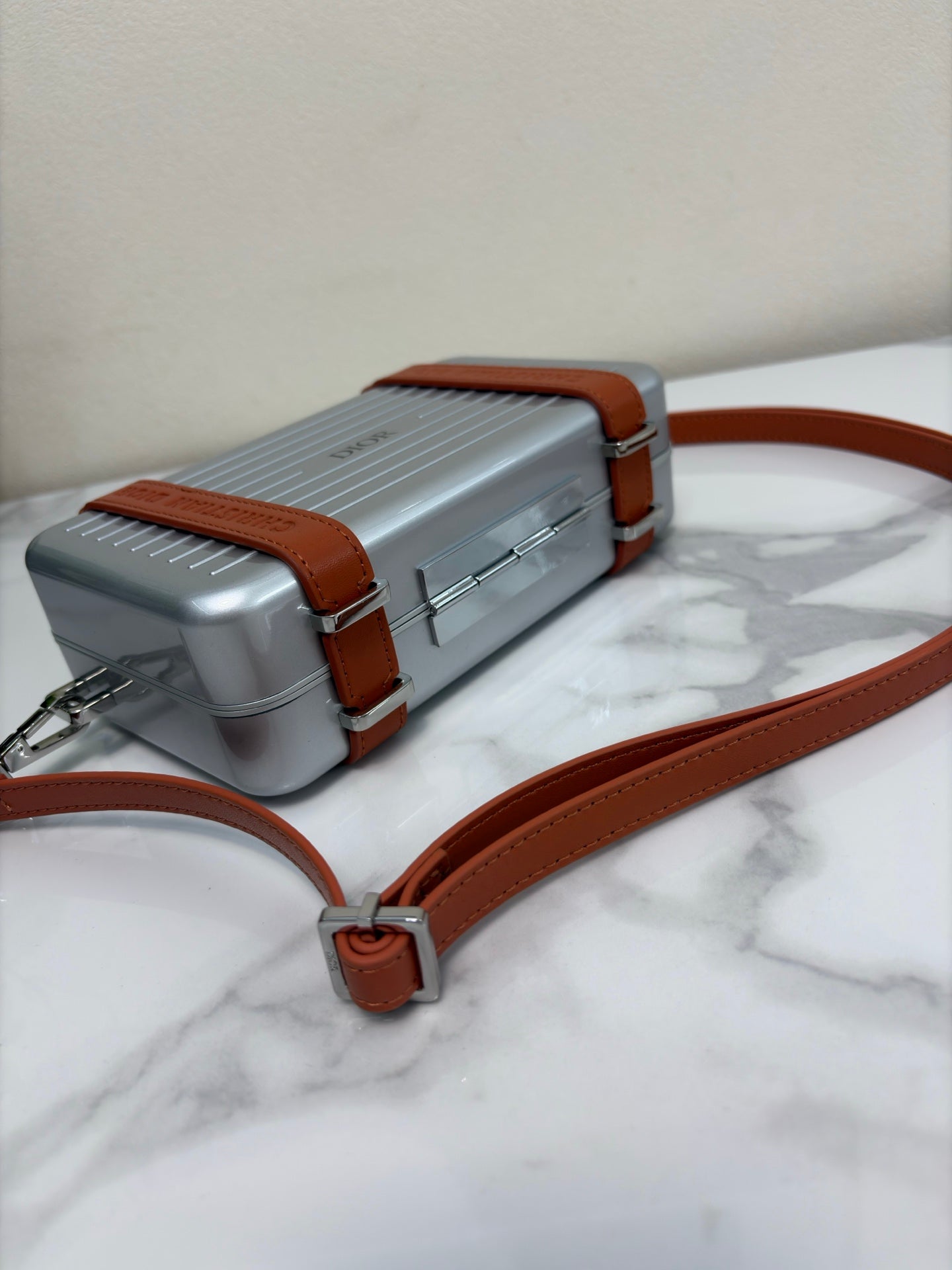 CHRISTIAN CROSS-BODY CLUTCH (BROWN)