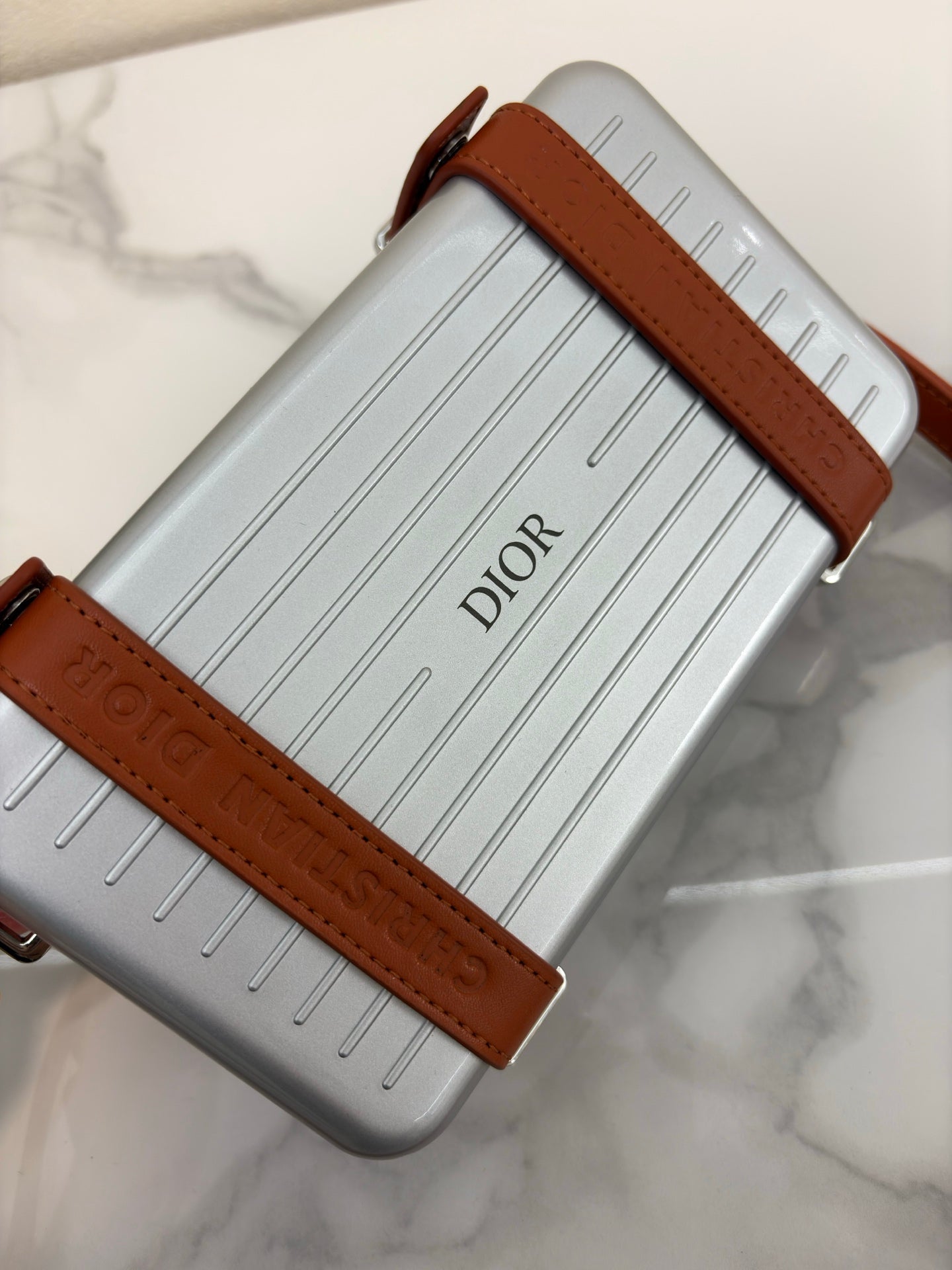 CHRISTIAN CROSS-BODY CLUTCH (BROWN)