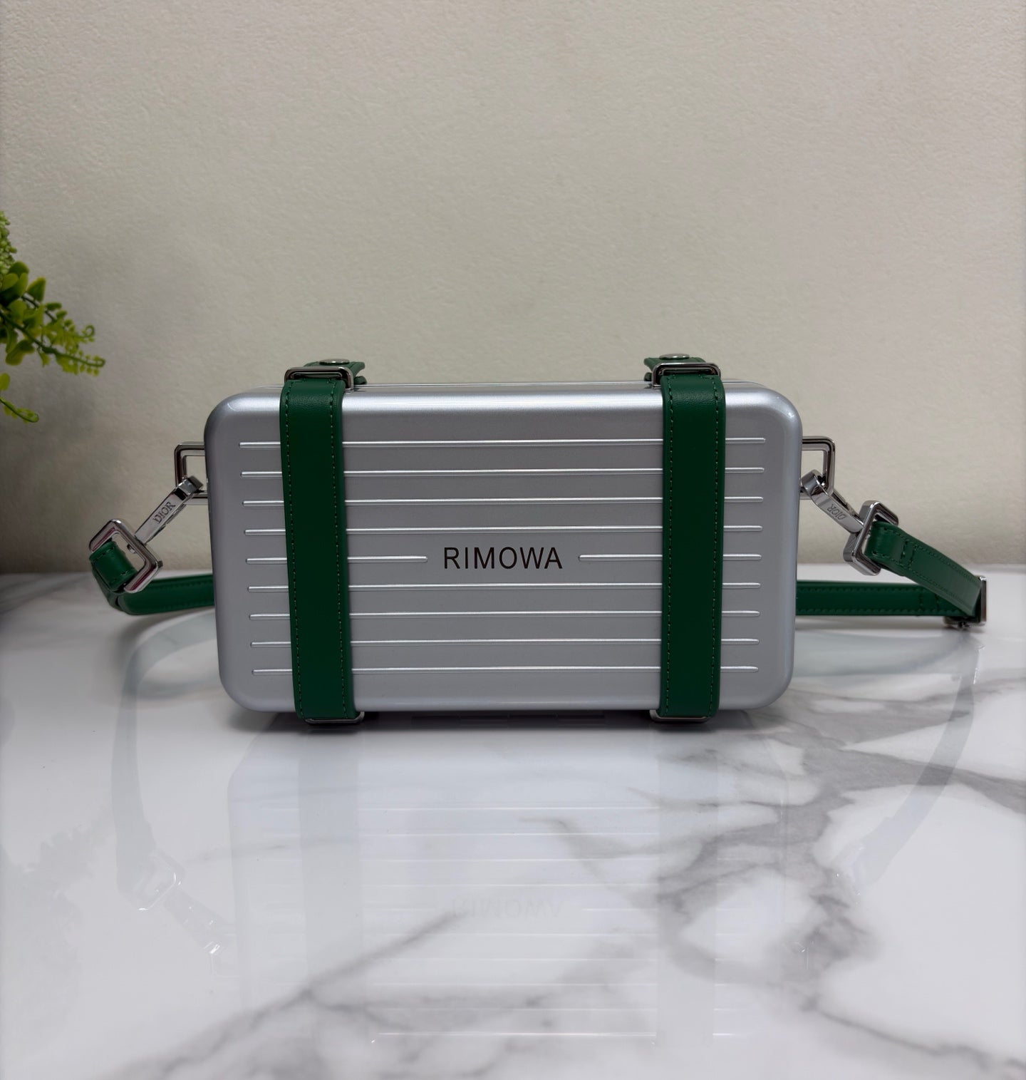 CHRISTIAN CROSS-BODY CLUTCH (GREEN STRAP)