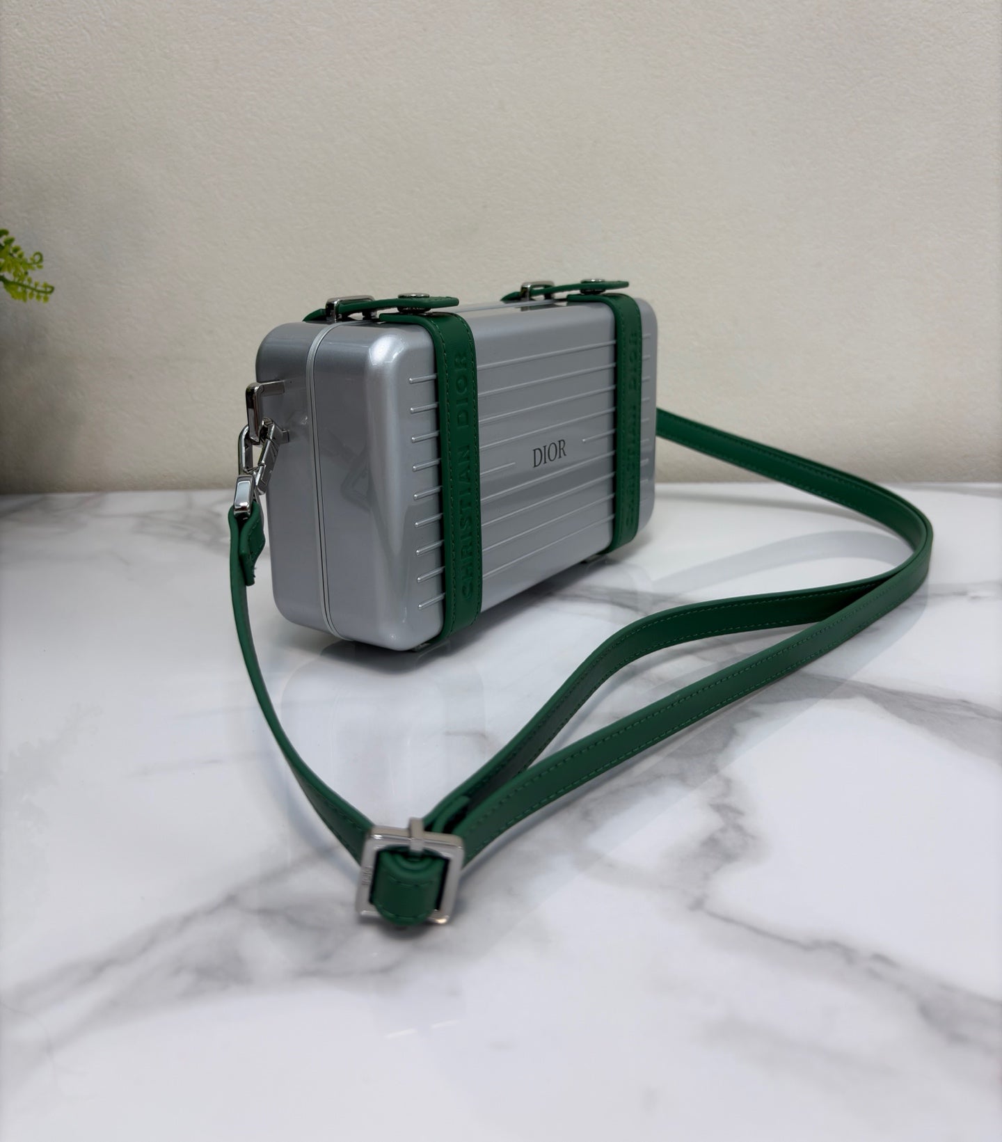 CHRISTIAN CROSS-BODY CLUTCH (GREEN STRAP)