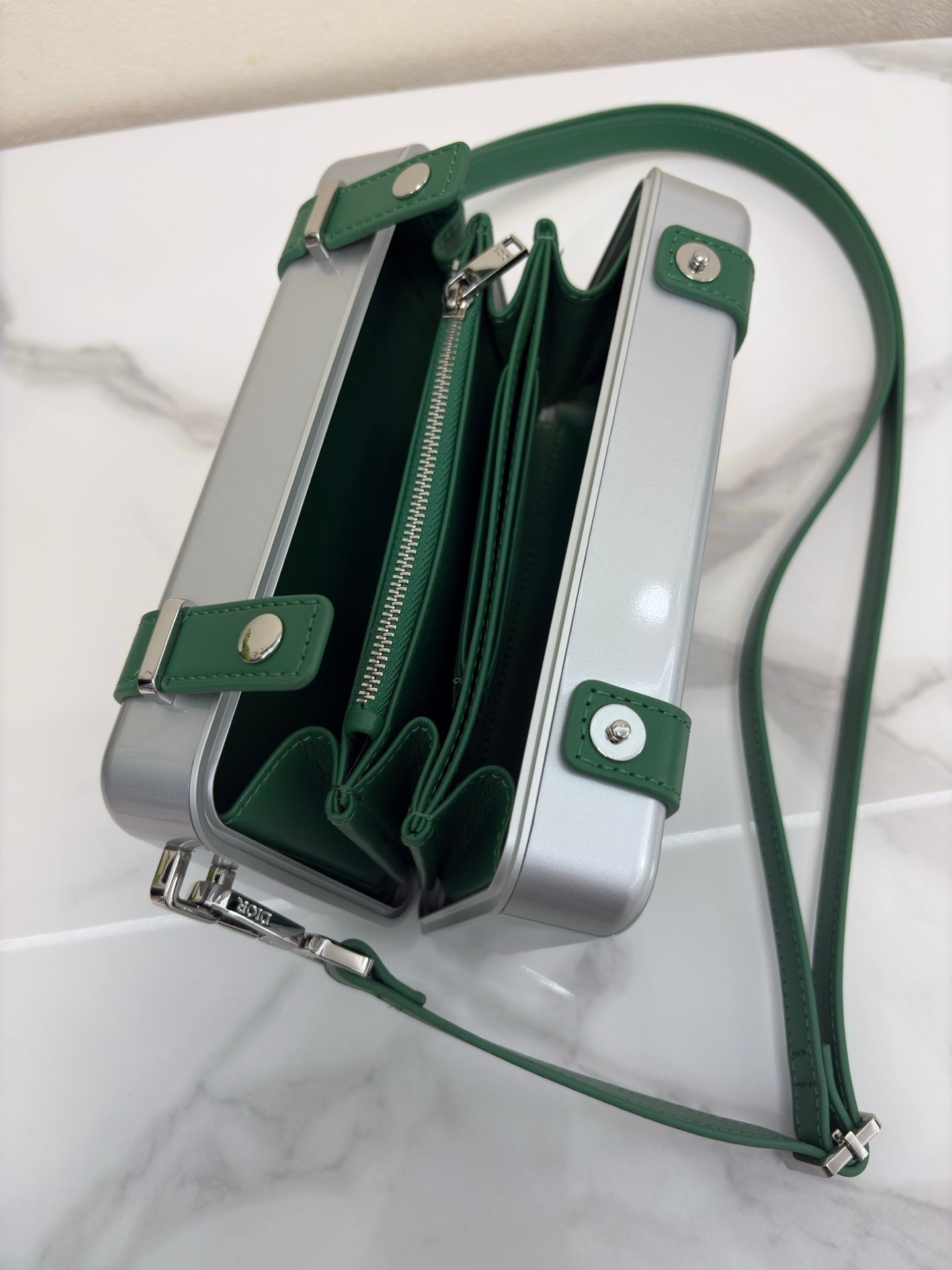 CHRISTIAN CROSS-BODY CLUTCH (GREEN STRAP)