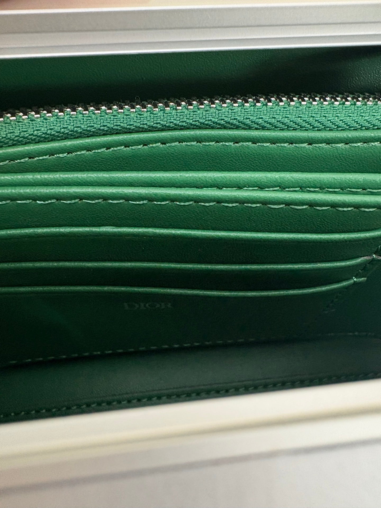 CHRISTIAN CROSS-BODY CLUTCH (GREEN STRAP)
