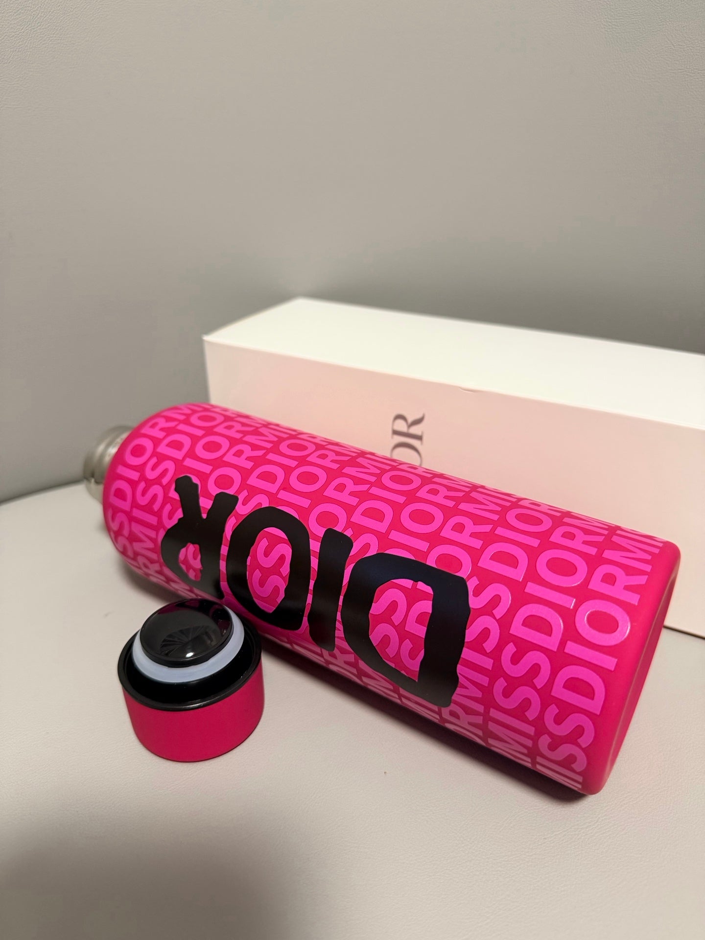 CHRISTIAN PINK BOTTLE