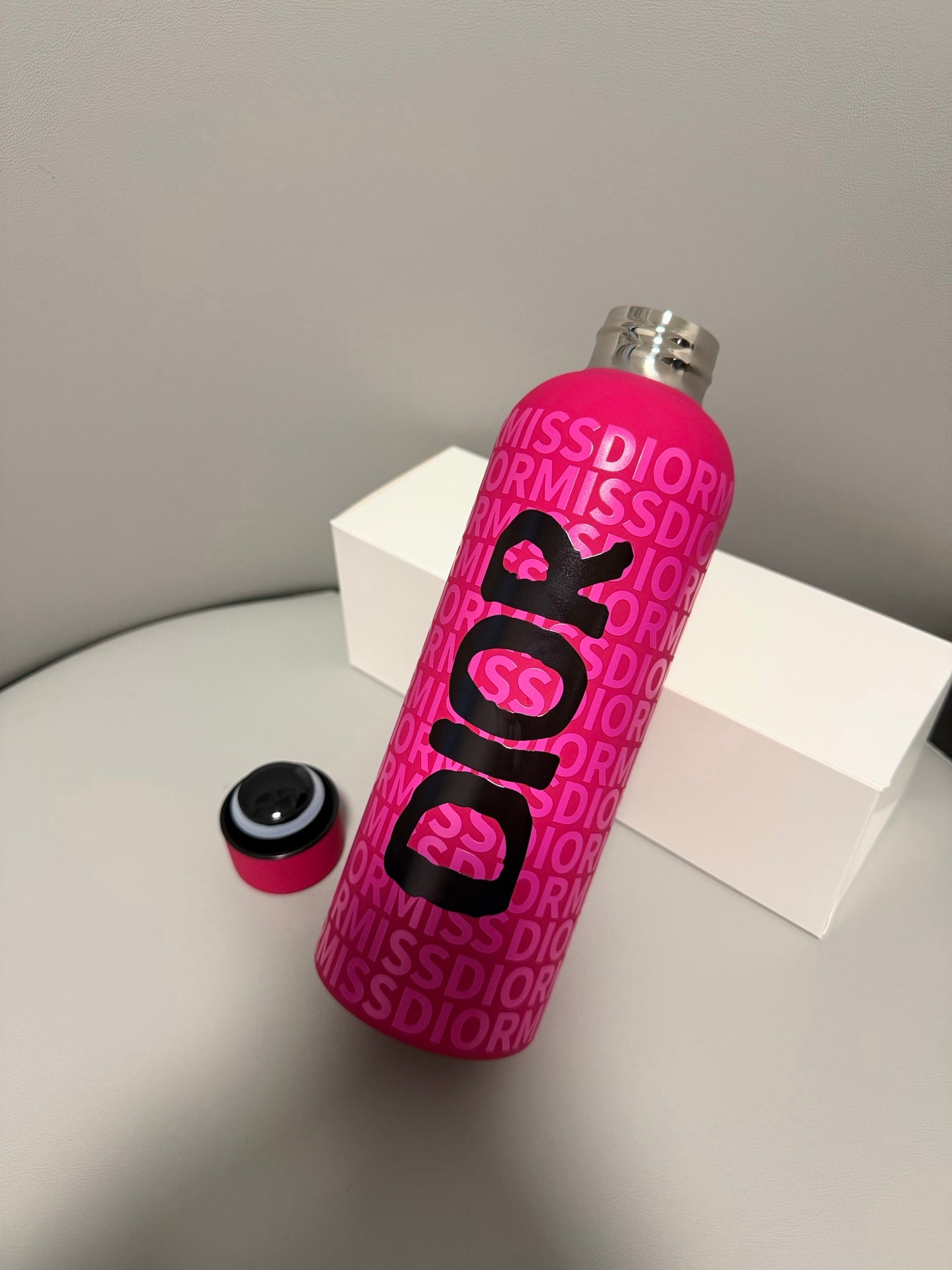 CHRISTIAN PINK BOTTLE