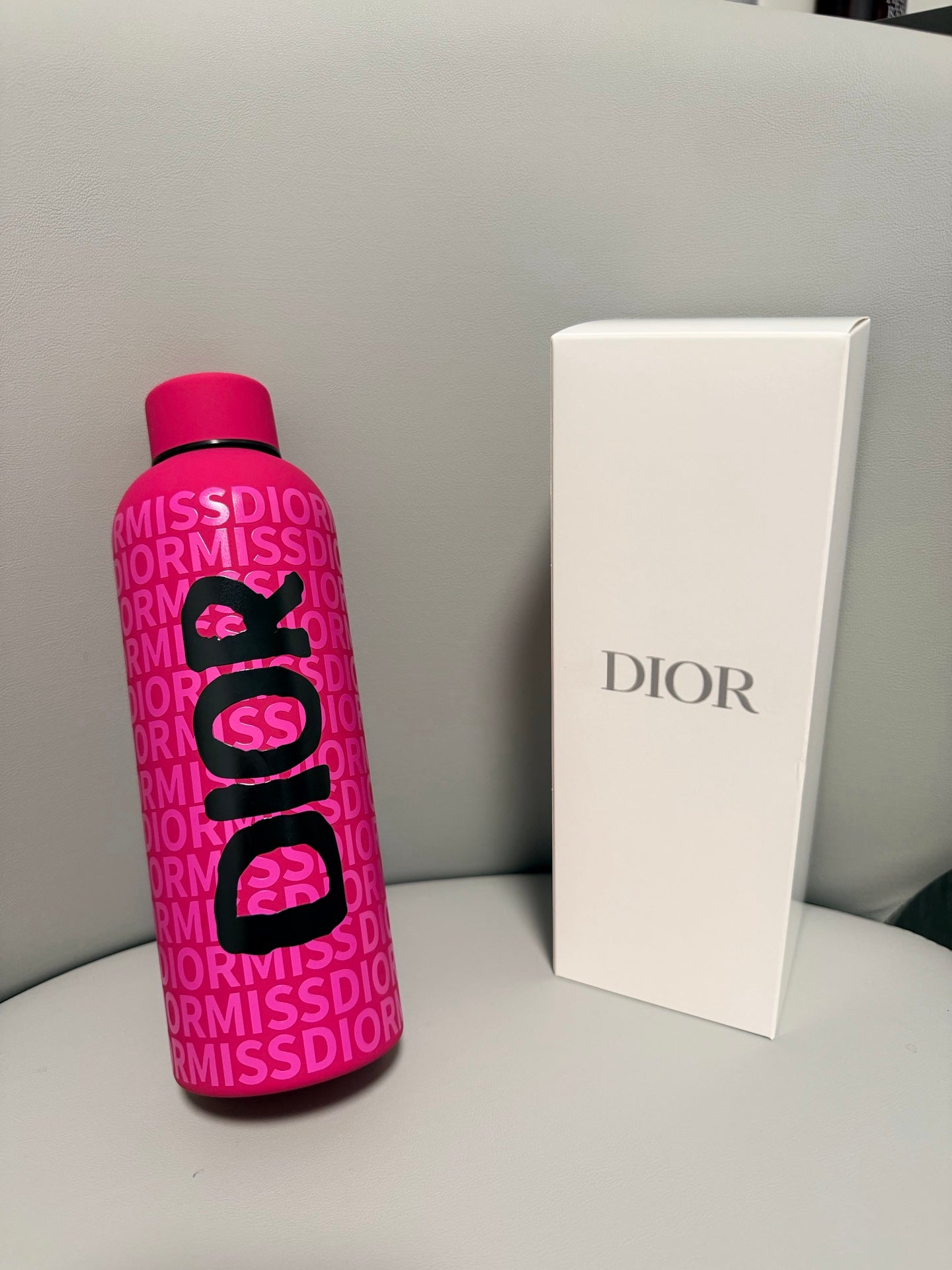 CHRISTIAN PINK BOTTLE