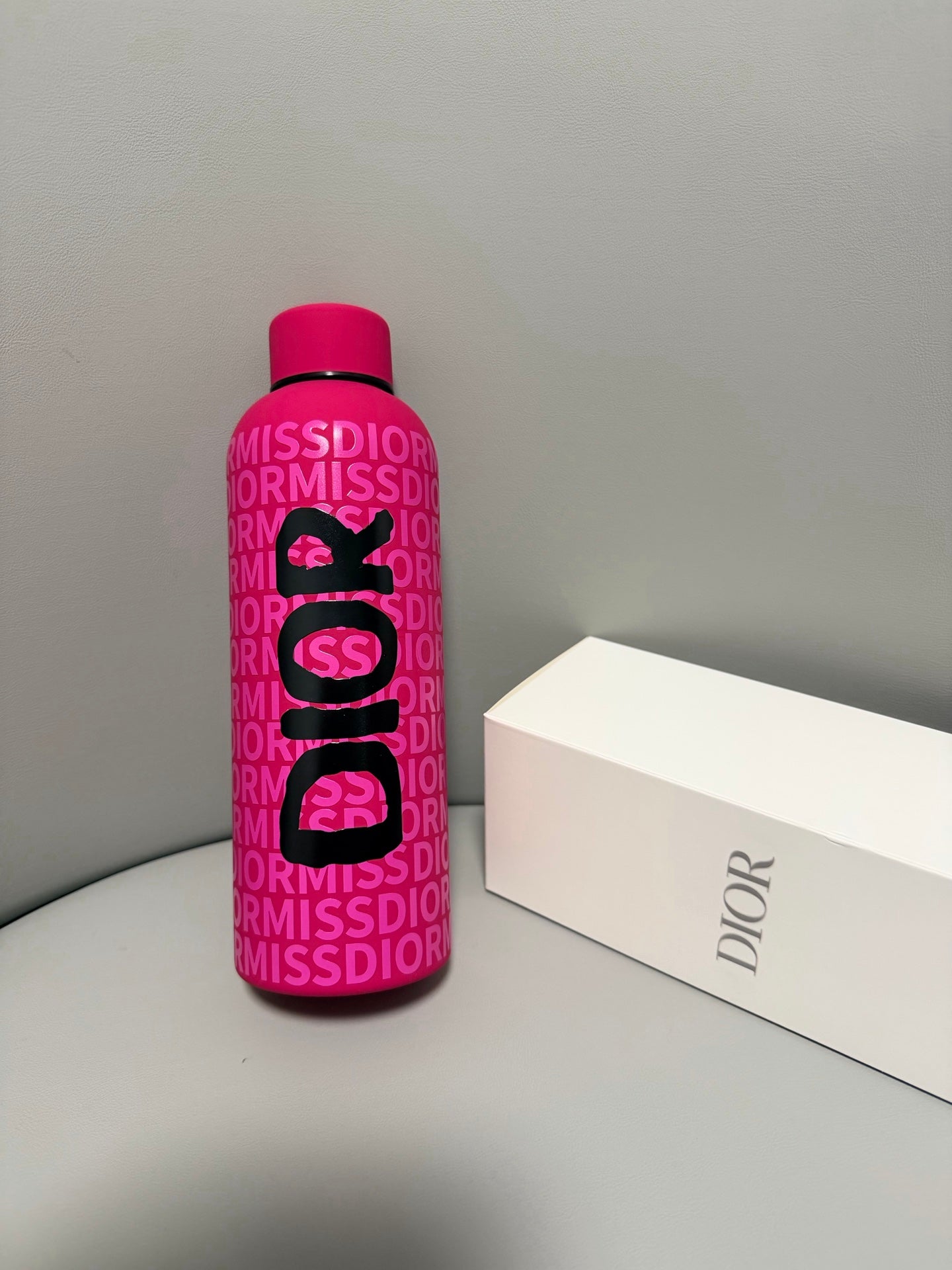 CHRISTIAN PINK BOTTLE