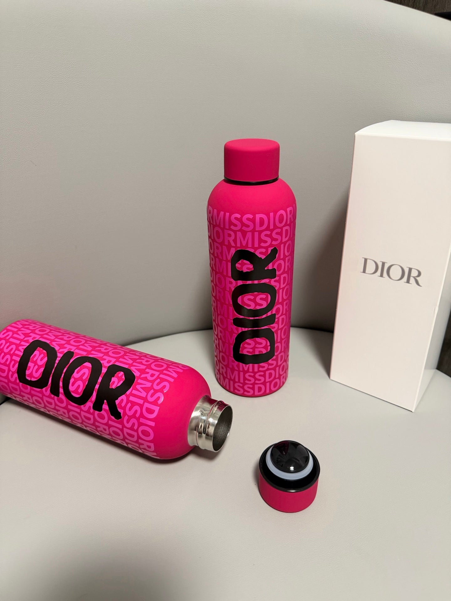 CHRISTIAN PINK BOTTLE