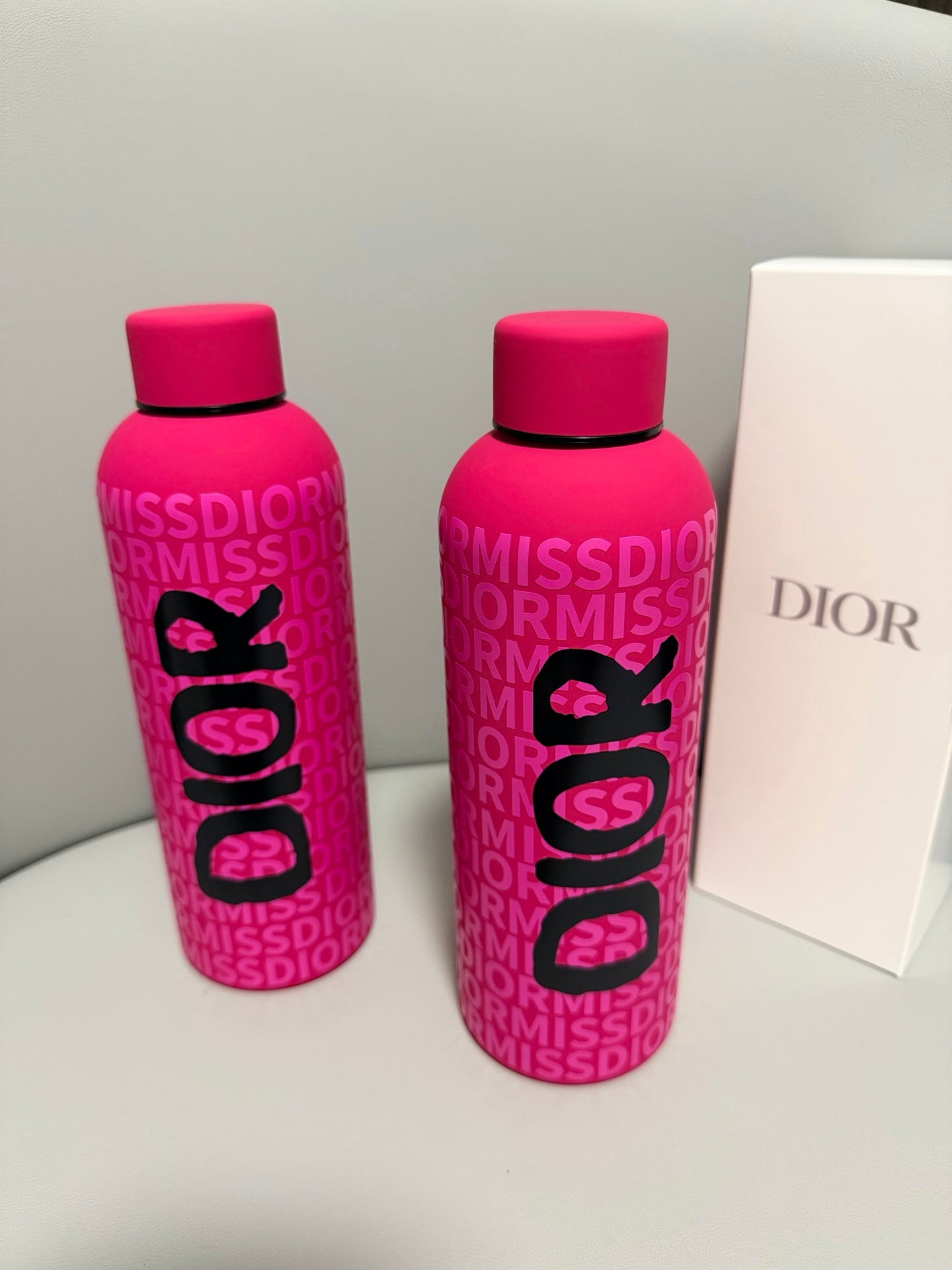 CHRISTIAN PINK BOTTLE